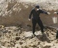 السلطات العراقية تكشف عن مقابر جماعية في بغداد تضم رفات ضحايا قتلهم إرهابيو “داعش”